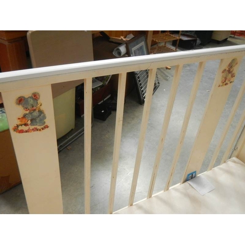 849 - An old painted babies cot.