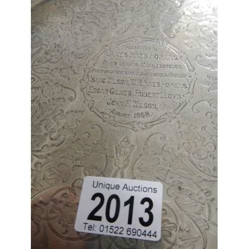 2013 - A hall marked silver presentation tray dated 1868, approximately 588 grams.