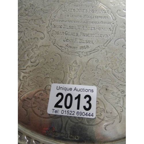 2013 - A hall marked silver presentation tray dated 1868, approximately 588 grams.