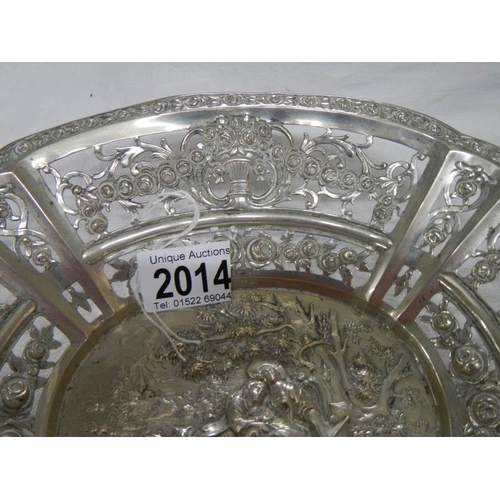 2014 - A foreign silver embossed dish, approximately 308 grams.