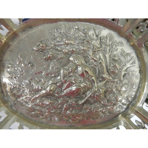 2014 - A foreign silver embossed dish, approximately 308 grams.