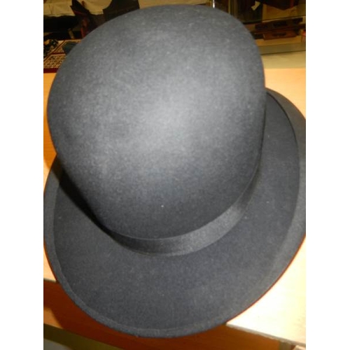 2104 - A good quality Woodrow London bowler hat,  approximate size 6 & 5/8''.