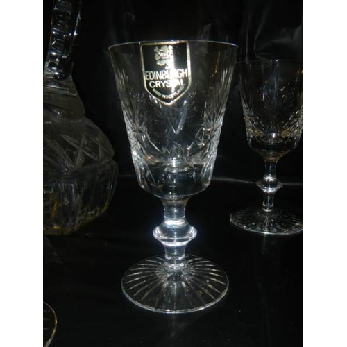 2114 - An unusual shaped Edinburgh crystal decanter and 6 Edinburgh crystal glasses.