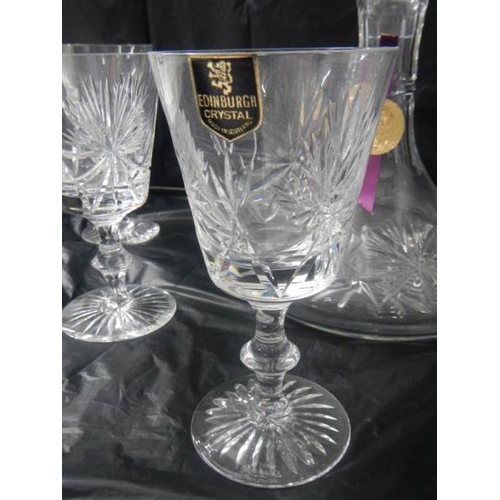 2115 - An Edinburgh crystal decanter and a set of 6 Edinburgh crystal glasses.