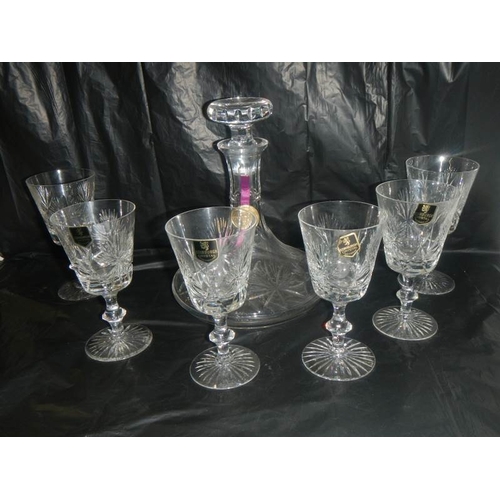 2115 - An Edinburgh crystal decanter and a set of 6 Edinburgh crystal glasses.