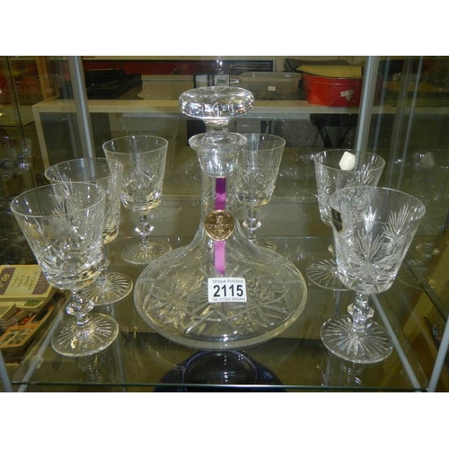 2115 - An Edinburgh crystal decanter and a set of 6 Edinburgh crystal glasses.