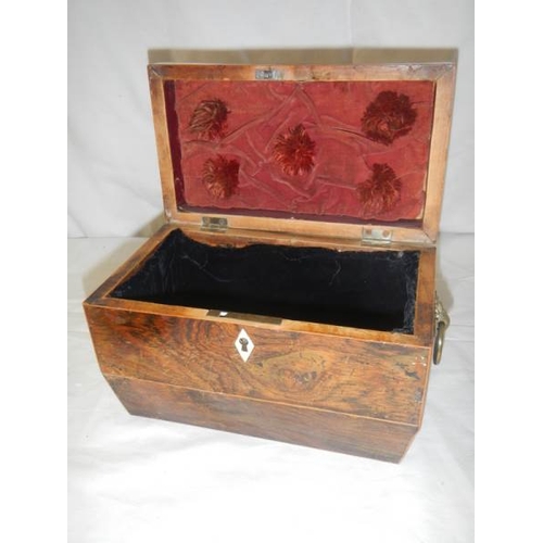 2124 - A figured mahogany caddy shaped box.