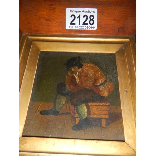 2128 - A Victorian oil on board in maple frame.