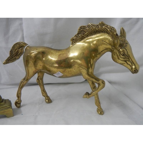 2129 - A Victorian brass greyhound doorstop and a brass horse.