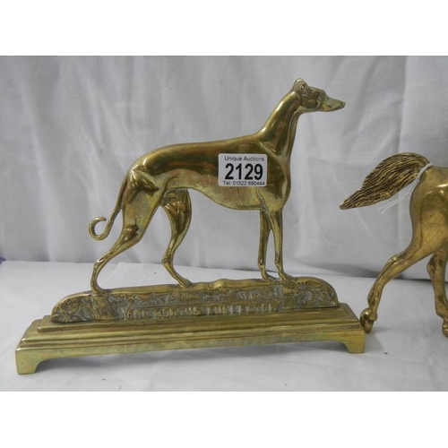 2129 - A Victorian brass greyhound doorstop and a brass horse.