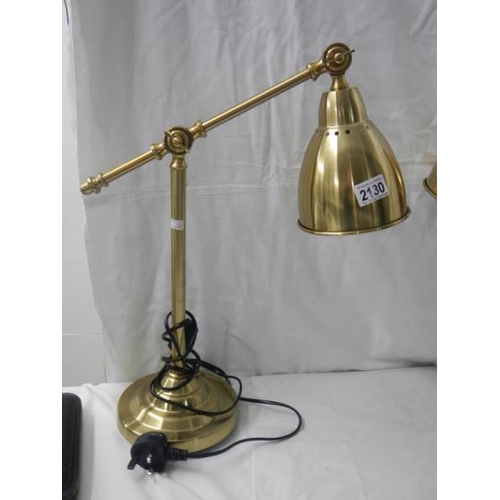 2130 - A pair of good quality mid 20th century adjustable table lamps.