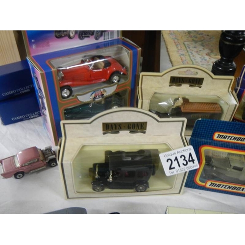 2134 - Approximately 25 model cars.