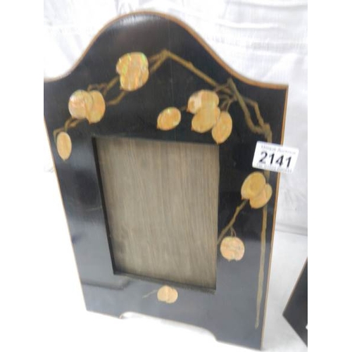 2141 - A pair of art deco inlaid photo frames, 10'' x 16''.