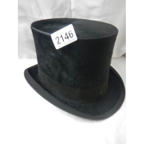 2146 - A top hat and a bowler hat.