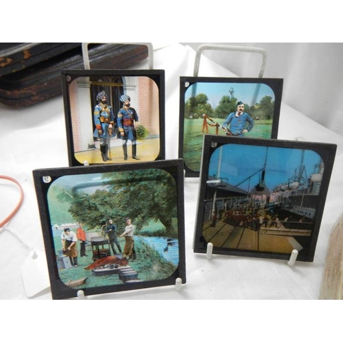 2160 - A good collection of coloured magic lantern slides.