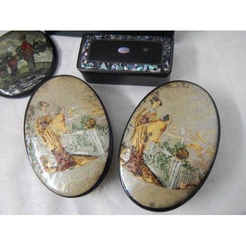 2165 - A mixed lot including papier mache' and mother of pearl snuff box.