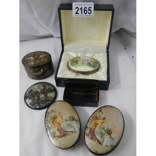 2165 - A mixed lot including papier mache' and mother of pearl snuff box.