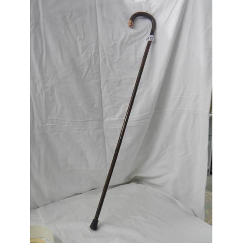 2172 - A walking stick with 9ct gold mount.