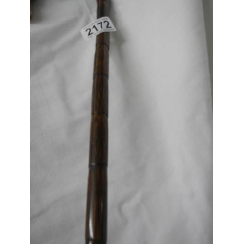 2172 - A walking stick with 9ct gold mount.