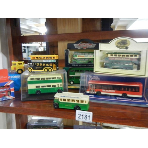 2181 - 2 shelves of Days Gone buses etch.,