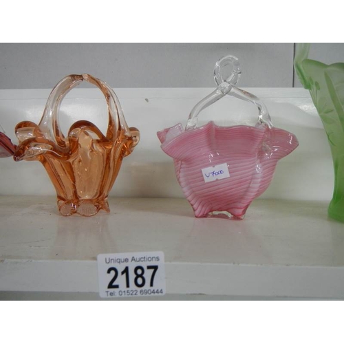 2187 - 8 art glass baskets.