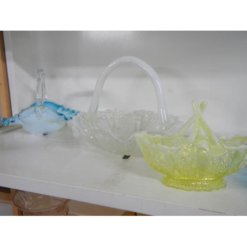 2187 - 8 art glass baskets.