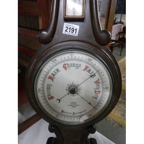 2191 - An aneroid barometer by H Manley, Opticians, Leeds.