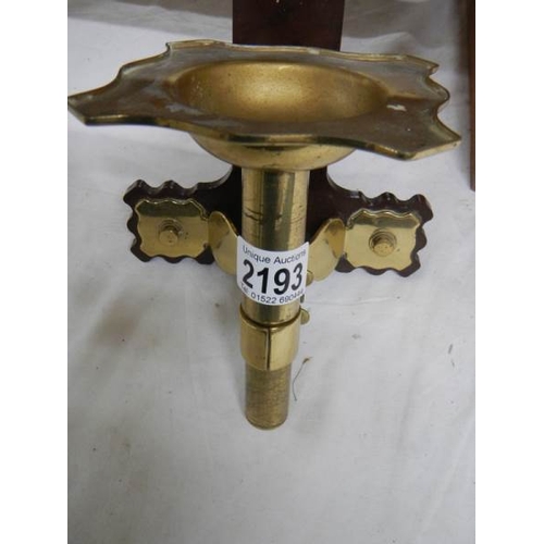 2193 - A brass and bakelite lantern clock wall bracket.