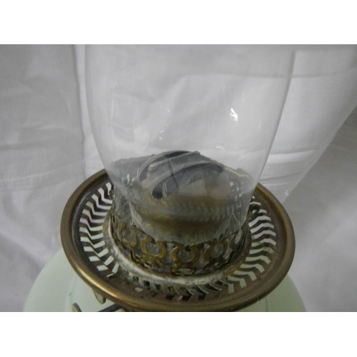 2216 - A Victorian oil lamp in good condition.