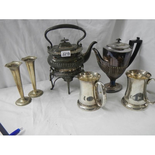 2219 - A Victorian pewter kettle on stand, pair of spill vases, coffee pot etc.,