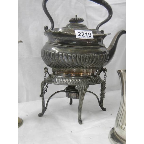 2219 - A Victorian pewter kettle on stand, pair of spill vases, coffee pot etc.,