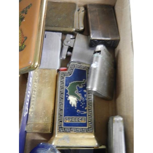 2231 - A mixed lot of old lighters, cigarette case etc.,