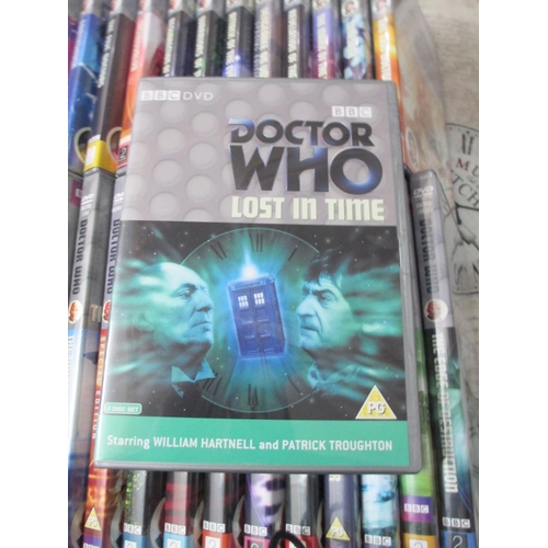 2243 - 65 classic Dr Who DVDs all as new. A Dr. Who complete first series (box a/f). A boxed series 1-7 (mi... 