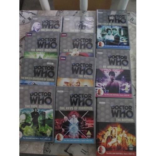 2243 - 65 classic Dr Who DVDs all as new. A Dr. Who complete first series (box a/f). A boxed series 1-7 (mi... 