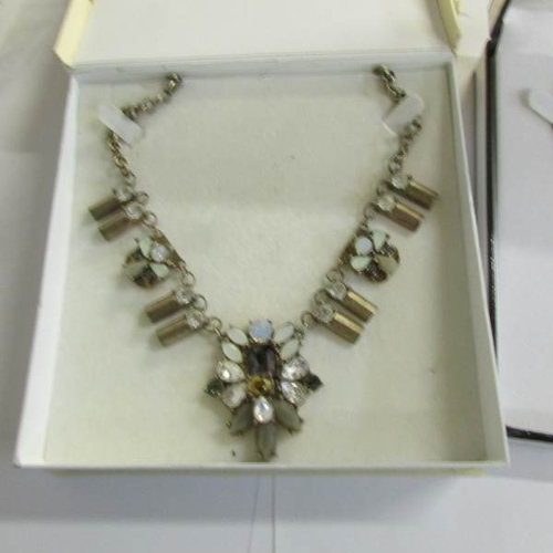 2045 - 2 dazzling vintage necklace and a further necklace in a designer style.