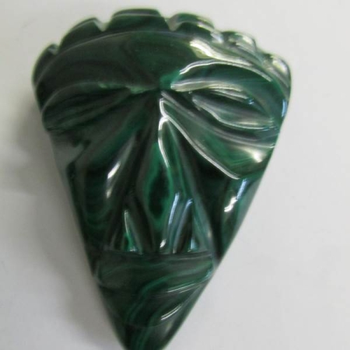 2071 - 2 malachite stone paperweights as heads.