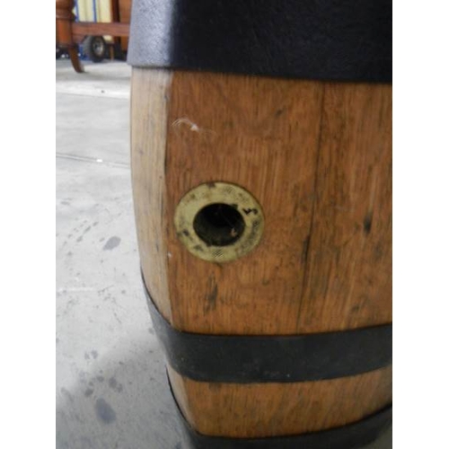 2266 - An old ship's whisky barrel with metal bands, 17'' tall.