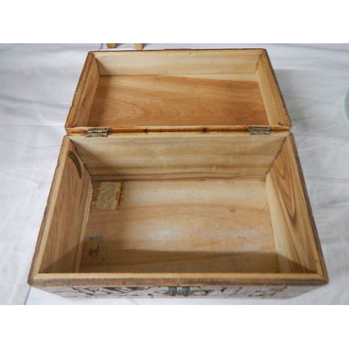 2268 - A carved camphor wood box, 12'' wide, catch broken.