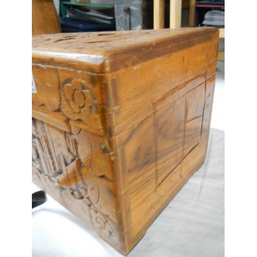 2268 - A carved camphor wood box, 12'' wide, catch broken.