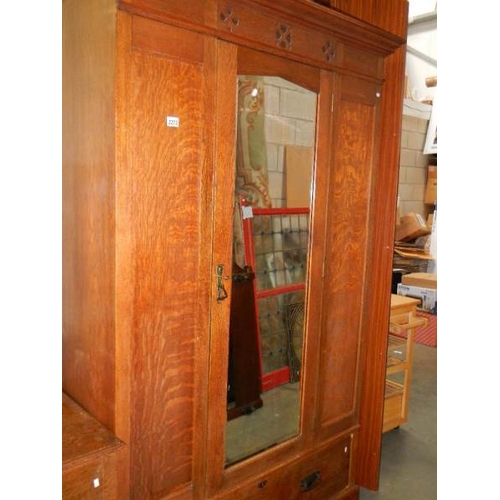 2273 - An oak wardrobe and dressing table.