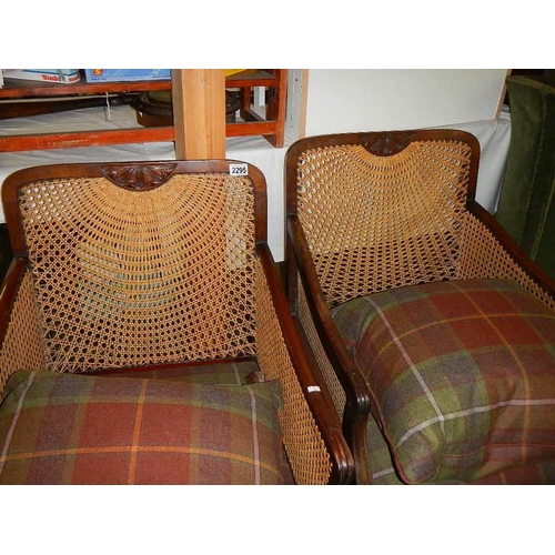 2295 - A pair of Bergere arm chairs.