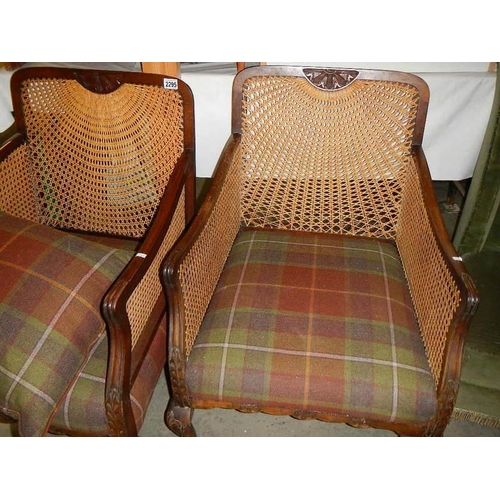 2295 - A pair of Bergere arm chairs.