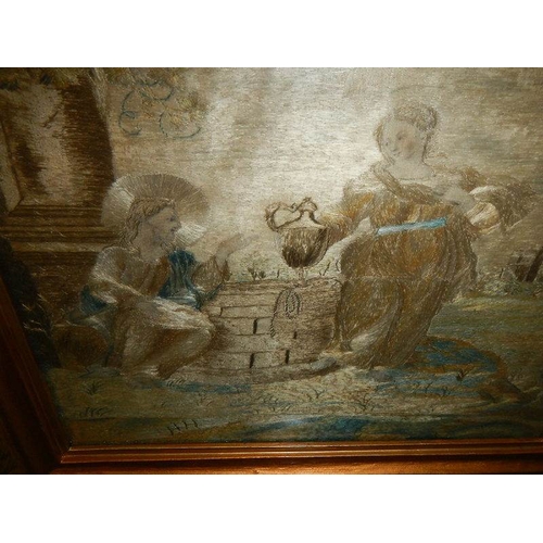 2302 - A gilt framed Italian antique embroidery depicting Jesus Christ at a well with a woman.  Hand writte... 