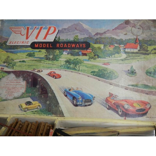 2303 - A 1960's V.I.P Victory Industries electric model roadways set with Austin Healey and MGA cars and in... 