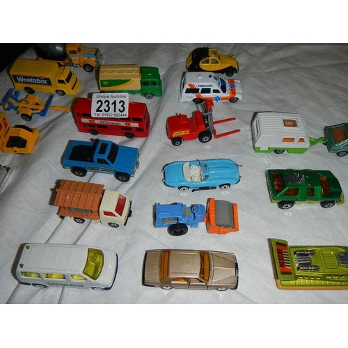 2313 - Approximately 50 die cast cars, trucks etc.,