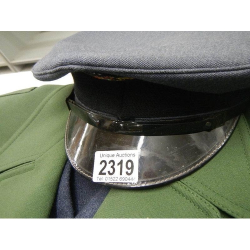 2319 - A Russian police uniform and one other.