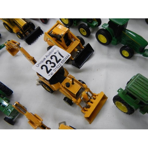 2327 - In excess of 40 die cast farm vehicles etc.,