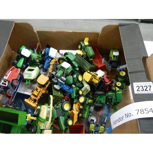 2327 - In excess of 40 die cast farm vehicles etc.,