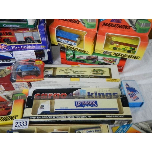 2332 - Approximately 30 boxed die cast models.