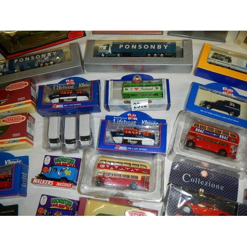 2332 - Approximately 30 boxed die cast models.